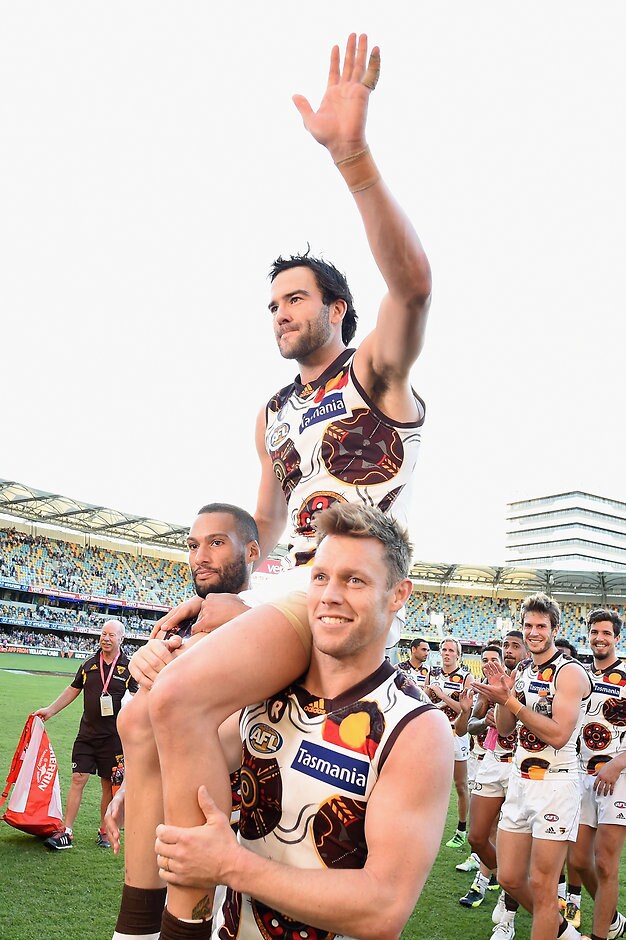 AFL 2016 Rd 10 - Brisbane v Hawthorn BRISBANE, AUSTRALIA - MAY 28: Jordan Lewis of the Hawks is chaired off the field during the 2016 AFL Round 10 match between the Brisbane Lions and the Hawthorn Hawks at The Gabba on May 28, 2016 in Brisbane, Australia. (Photo by Matt Roberts/AFL Media)